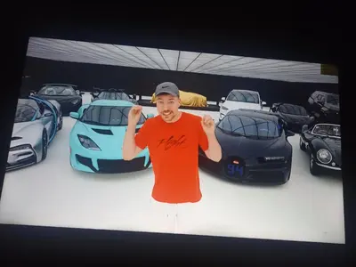a man standing in front of a group of cars at Caravan & Smart in Bangkok
