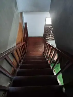 a view from the top of a spiral staircase at Bang lumphu house&bistro in Bangkok