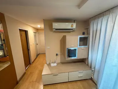 a room with a kitchen with a microwave and a window at 2bd Apartment near icon Siam close to Everything in Bangkok