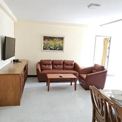a living room with a couch and a table at Omni Suites 2Bedroom in Bangkok