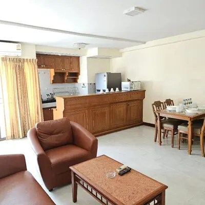 a living room with a couch and a table at Omni Suites 2Bedroom in Bangkok