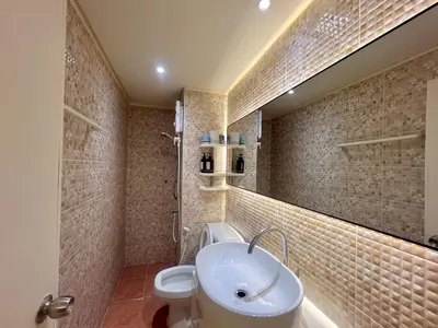 a bathroom with a sink and a toilet in it at Better Room ห้องพักรายวัน เมืองทองธานี C4 in Ban Bang Phang