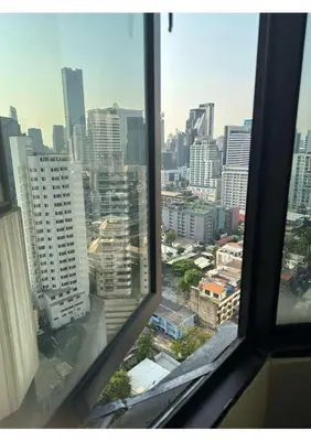 a view from an office window of a city at Affordable Serviced Apartment Nana - Omni Tower Sukhumvit location in Bangkok