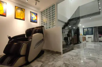 a living room with a couch in the middle of a room at Cozy home @ Chatcuchak/中文服务 in Bang O