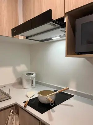 a kitchen with a bowl and utensils on a counter at Nue Z-Square Suan Luang Station - Cozy 2BR Condo, Pool&Gym, Near Suan Luang Station in Bangna