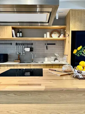 a kitchen with a sink and a counter top at Brown's Residence in Bangkok