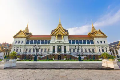 a large building with gold spires on top of it at Alameda Suites Hotel in Bangkok