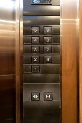 an elevator with a bunch of numbers on it at SURANG MANSION in Ban Bang Khen (1)