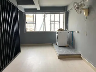 an empty room with a refrigerator and a window at Bangkok vibe, City House, 7 mins to BTS, City center, Private room in Sathon, Private bathroom, Bangkok, Thailand in Bangkok