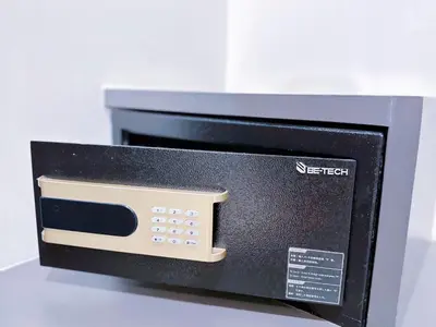 a microwave oven sitting on top of a counter at 14 Sathorn Hotel in Bangkok