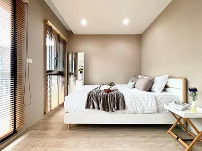 a bedroom with a large white bed in a room at Free pick up and Stunning Luxury Family Home 2B2B in Bangkok