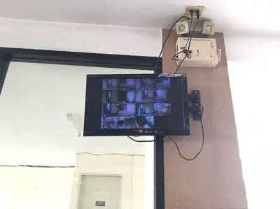 a flat screen tv hanging from a wall at jw place รามคำแหง 40 in Bangkok