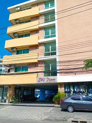 a car parked in front of a building at jw place รามคำแหง 40 in Bangkok