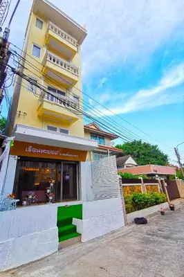 a building with a store in front of it at Fall Asleep hotel in Nonthaburi