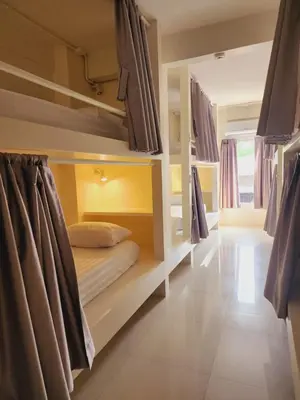 a room with bunk beds in a hostel at Line Bangkok Hostel in Bangkok