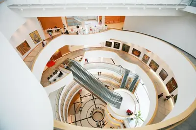 an overhead view of a spiral staircase in a building at The Palette Bangkok Hotel - Self check-in after 10 pm in Bangkok