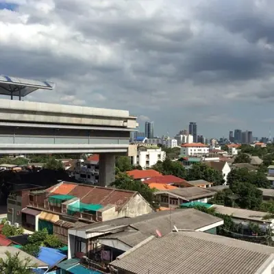 a view of a city with buildings and a building at The State Apartment in Bangkok