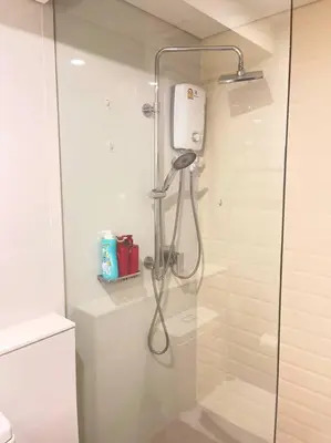 a shower in a bathroom with a glass door at Siamese 87 2BR \u7d20\u5764\u9038 BTS On Nut LOFT \u4e24\u623f 25 in Bangkok