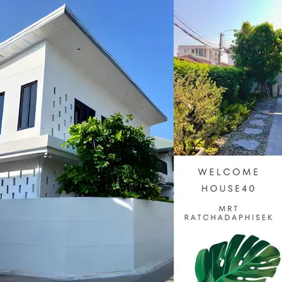 a picture of a white house and a picture of a garden at House40 MRT Ratchadaphisek in Bangkok