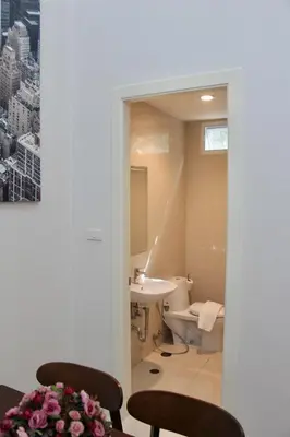 a bathroom with a sink and a toilet at Entire 3BR Townhome, Pool, Sukhumvit, BTS&MRT Asok in Bangkok