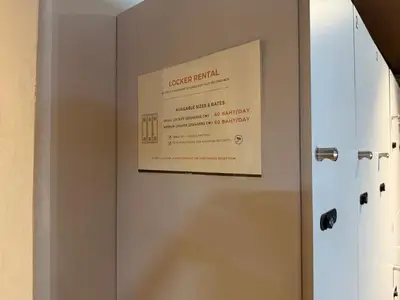a sign on the door of a room at My House Guesthouse & Restaurant in Bangkok