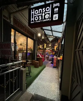 a store with a sign that reads hawaiian lobster at Hansa Hostel Bangkok Khaosan in Bangkok
