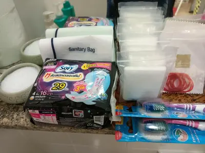 a counter with some toothbrushes and other hygiene items at Condo I-House Laguna Garden RCA - Behind Sukhumvit Thonglor Asoke Emporium Bangkok Hospital Piyavet Hospital Makkasan Airport Link MRT SKY TRAIN in Bangkok