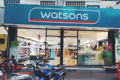 a store with motorcycles parked in front of it at Single Beds, Private Bath & Balcony, Shared Kitchen with Local Family by Pillows & Purrs in Bangkok