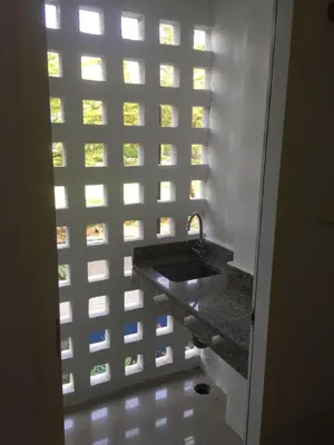 a bathroom with a sink and a window at Savi Rooms Premium studio near bkk Piyavet hospital near most famous pubs in Bangkok