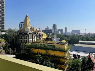 a view of a city from the roof of a building at Petch Tower Ekkamai in Bangkok