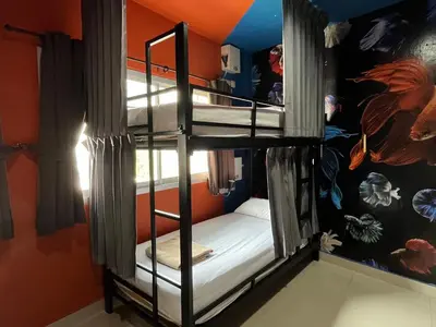 a bunk bed room with two bunk beds in it at Everyday Bangkok Hostel in Bangkok