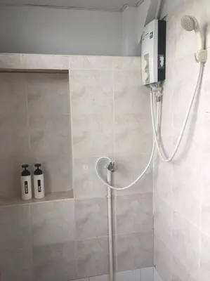 a shower in a bathroom with a shower at Room@Vipa in Bangkok