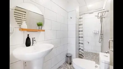 a white bathroom with a sink and a toilet at 3A-168 House Near BTS-icon siam in Godown