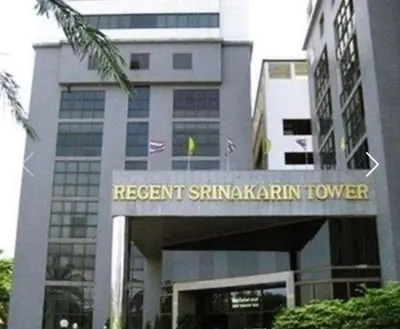 a building with a sign in front of it at Regent Srinakarin 19A in Bangkok