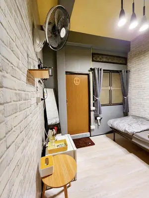 a tiny room with a sink and a bed at 110-Olan Place Homely room Free Wi-Fi and Near BTS line in Bangkok