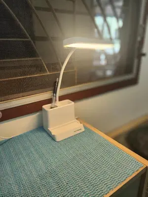 a lamp sitting on top of a table at J Place Studio 204 with nice fan free Wifi, near Skytrain in Bangkok