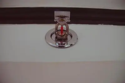 a metal object sitting on top of a shelf at Town In Town Gardent Resort in Sathani Khlong Tan