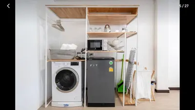 a laundry room with a washer and dryer at 168 House 3B Near BTS iconsiam in Godown