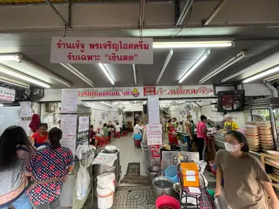 a group of people in a food market with masks at 168 House 3B Near BTS iconsiam in Godown