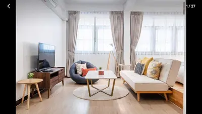 a living room with a couch and a tv at 168 House 3B Near BTS iconsiam in Godown