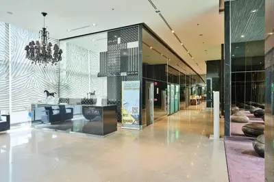 a lobby of a building with a chandelier at 5mins walk to BTS Thonglor, easy access 1 bedroom in Bangkok