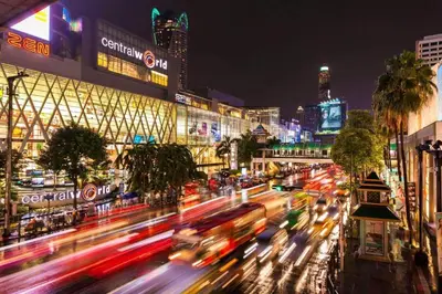 a busy city street at night with cars at XX Wish Inn Chidlom V วิช อินน์ ชิดลม 2 in Bangkok