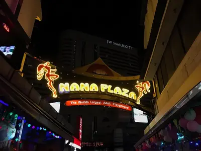 a neon sign for a nana plaza on a building at Elite Hotel Nana Sukhumvit 3 in Bangkok