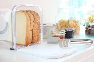 a loaf of bread in an open refrigerator at ResT Bangkok Poshtel in Bangkok
