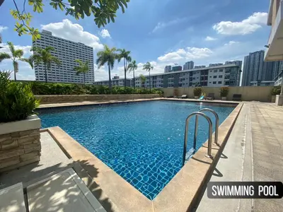 a swimming pool on the roof of a building at Luxe Design l Wellness & Tropical Retreat l No fee in Bangkok