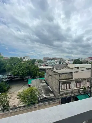 a view of a city from a building at Happy Hope in Bangkok