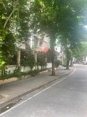 a street with a house on the side of the road at Viriyapon first floor2 in Bangkok