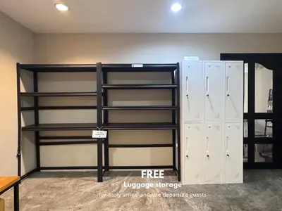 a locker room with shelves and lockers at Vélin Khaosan - 4th Floor apartment with 2Bedrooms in Bangkok