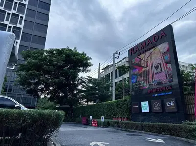 a large sign in front of a building at S87-7052 BTS Onnut High Floor Gym Swim Good View in Bangkok