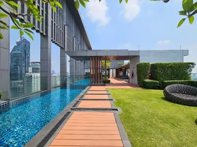 a swimming pool on the roof of a building at The Address 28 in Bangkok